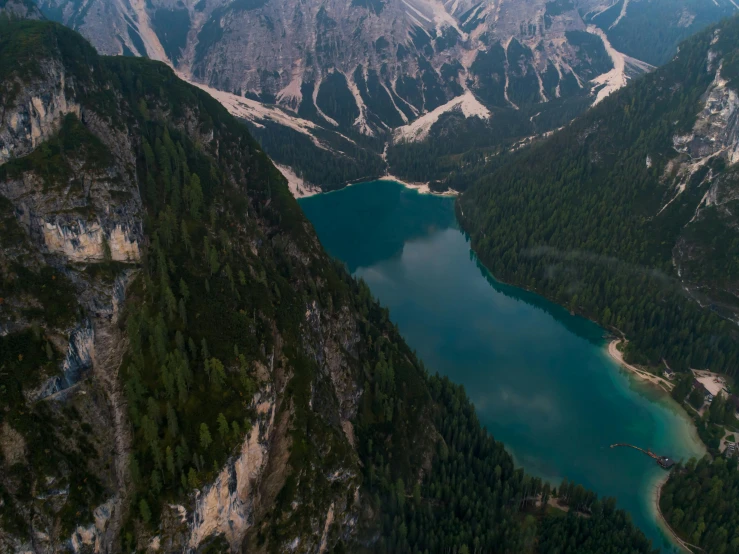 a large body of water surrounded by mountains, by Sebastian Spreng, pexels contest winner, drone footage, italy, fan favorite, crystal lake