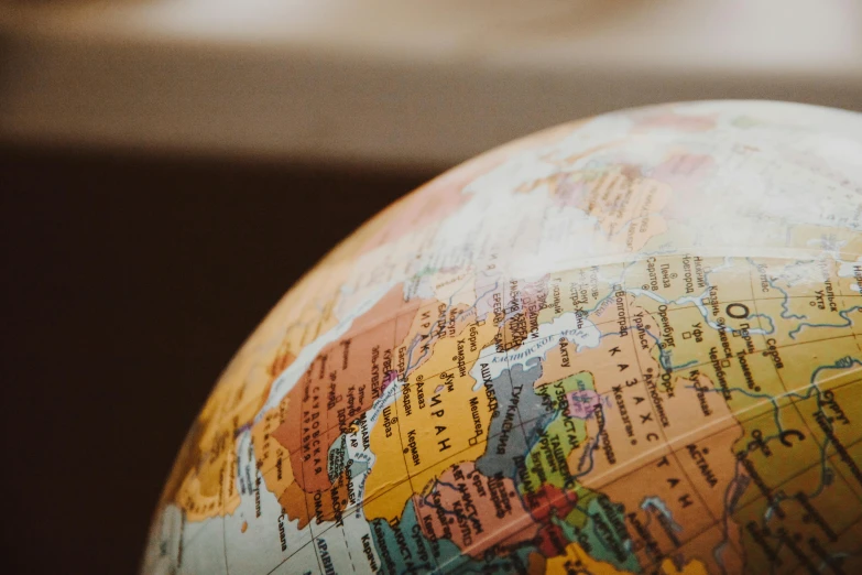 a close up of a globe on a table