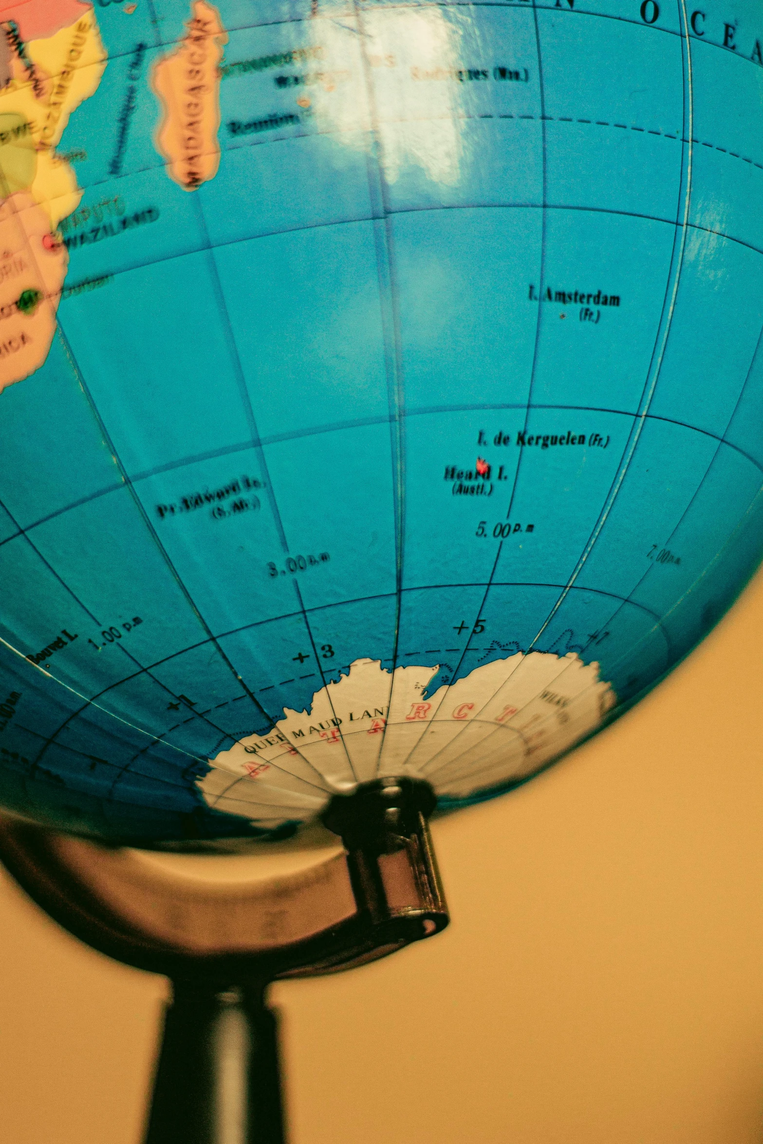 a close up of a globe on a stand