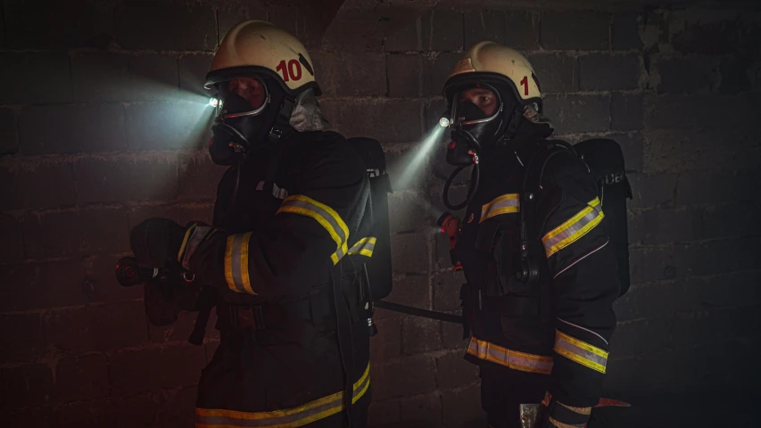 a couple of firemen standing next to each other, a picture, shutterstock, happening, cinematic lighting h 704, underground, ad image, halloween