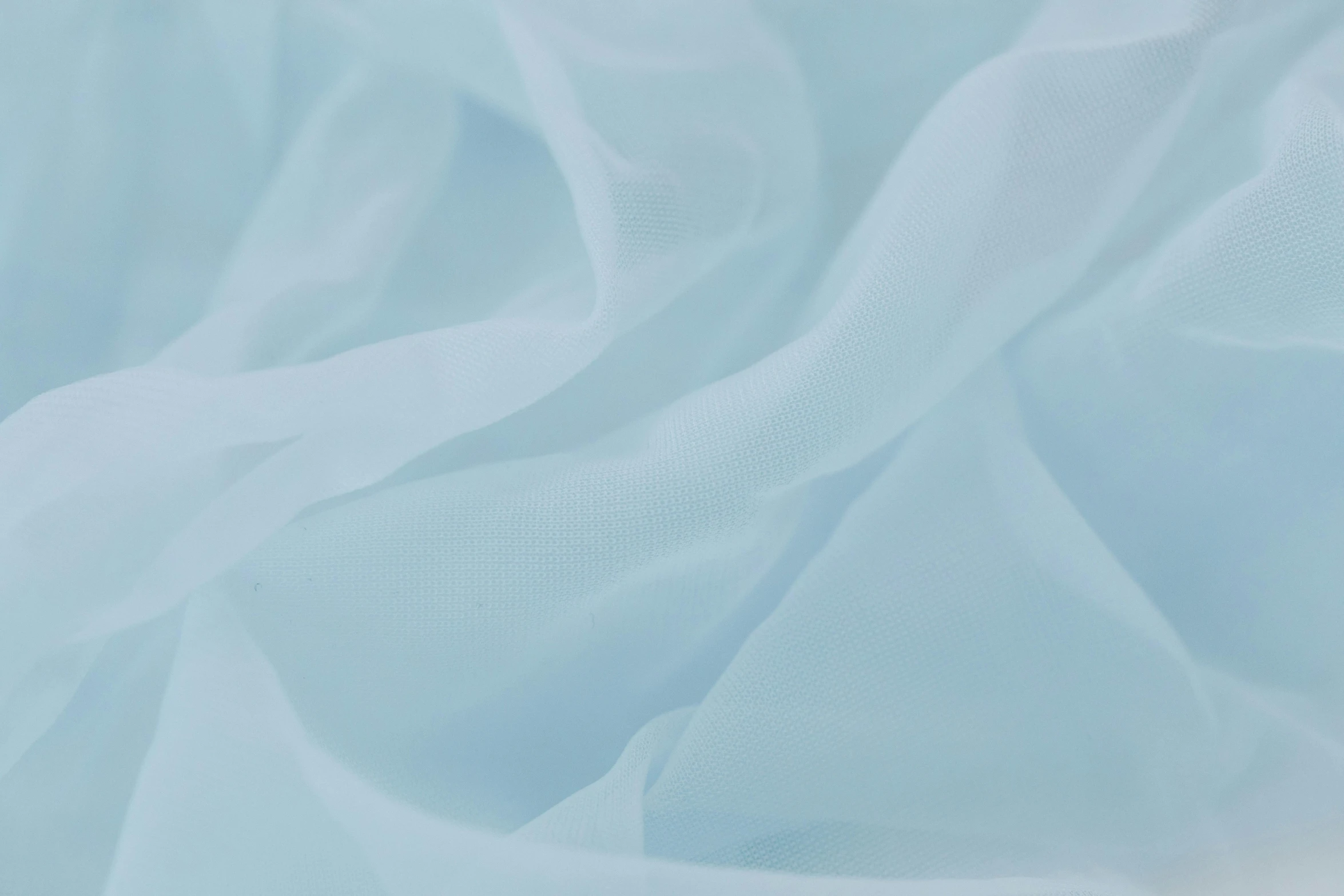 a close up of a light blue fabric, veiled in mist, full colour, smooth translucent white skin, white hue