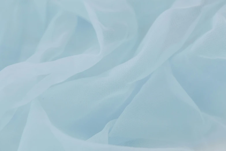 a close up of a light blue fabric, veiled in mist, full colour, smooth translucent white skin, white hue