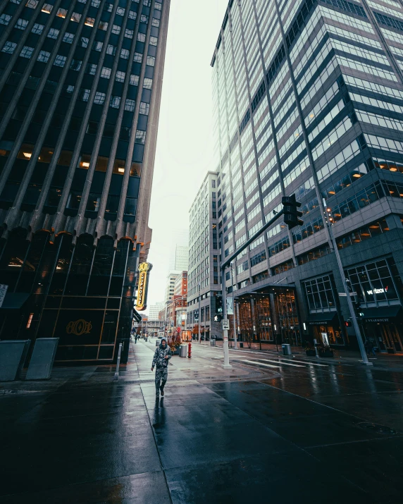 a person walking down a city street in the rain, high rise buildings, instagram post, architecture photo, american city