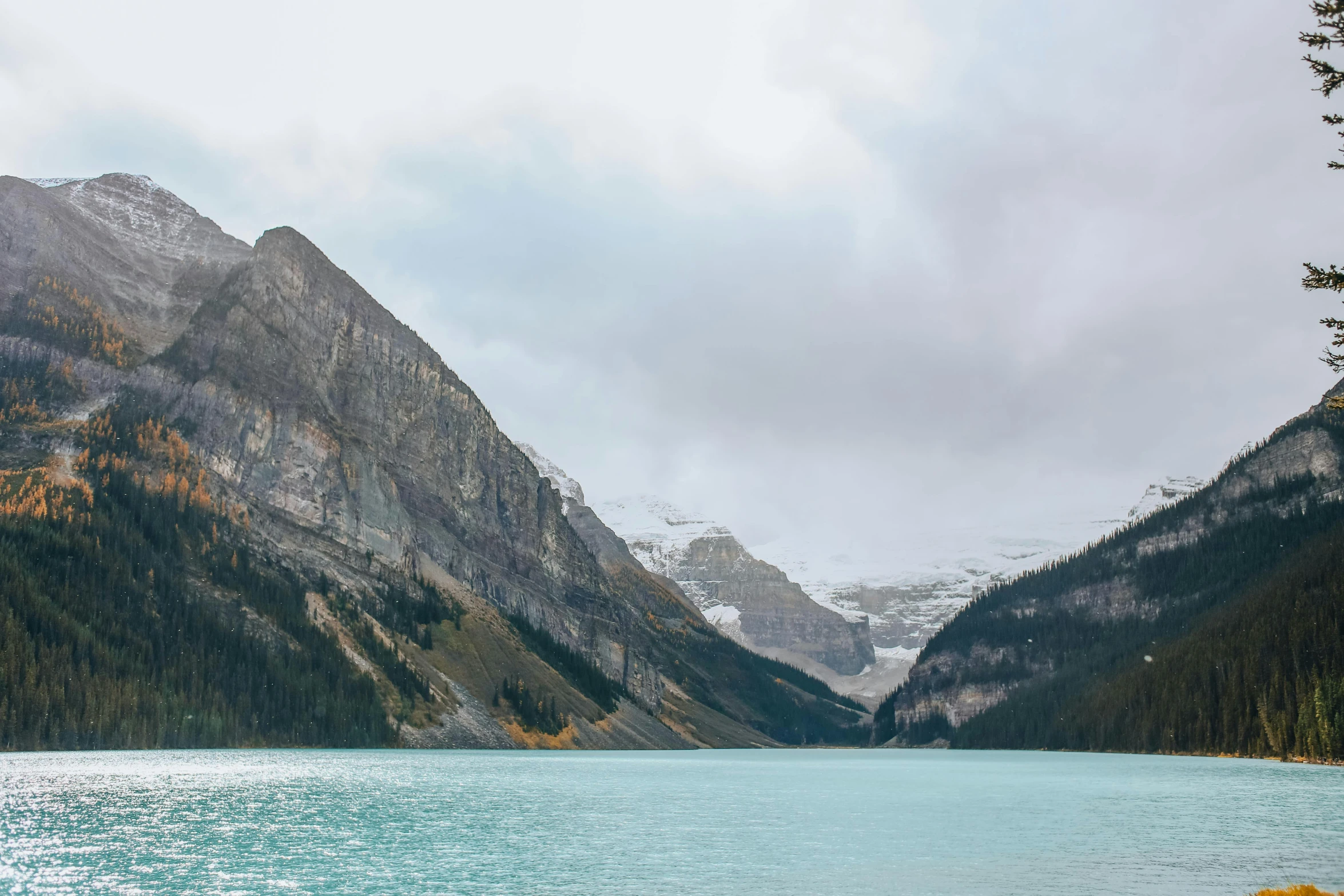 a body of water with mountains in the background, by Sophie Pemberton, pexels contest winner, banff national park, wall of water either side, conde nast traveler photo, fan favorite