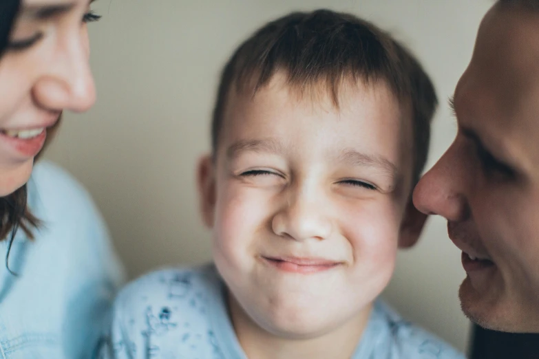 a close up of a person and a child, winking at the camera, touching heads, long crooked nose, thumbnail