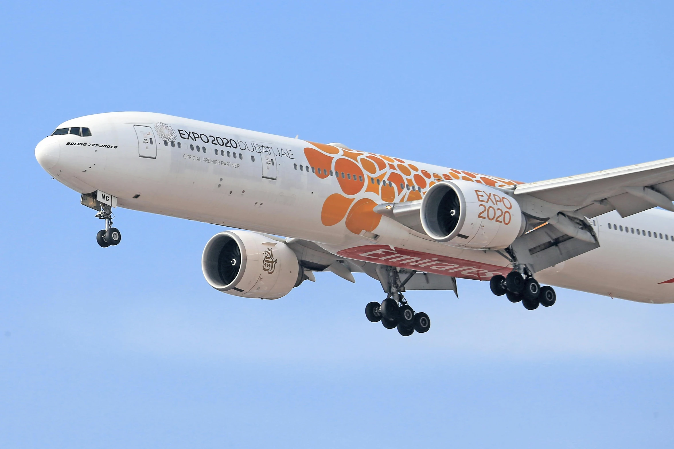 a large jetliner flying through a blue sky, a digital rendering, pexels contest winner, arabesque, orange pastel colors, kyoto, covid, brocade