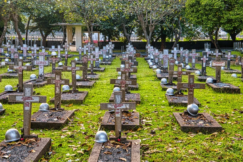 a cemetery filled with lots of headstones and tombstones, a colorized photo, by Alexander Fedosav, flickr, swords stuck in the ground, land mines, in australia, in sao paulo