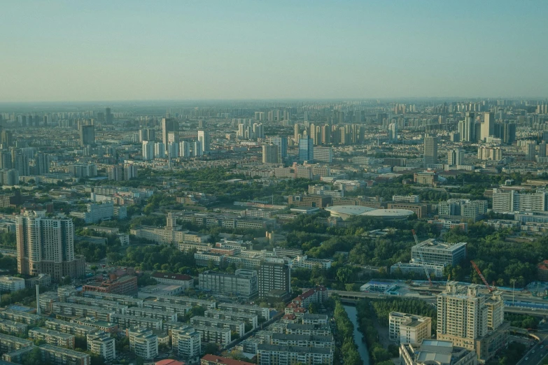 a view of a city from the top of a building, golden hour in beijing, high res 8k, fan favorite, moscow