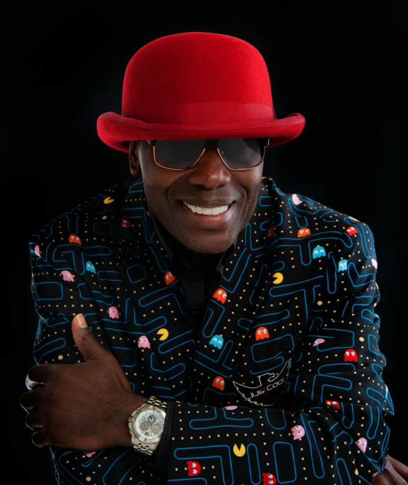 a man wearing a red hat and jacket, inspired by Michael Ray Charles, lance reddick, bright on black, the macho duck, blue velvet