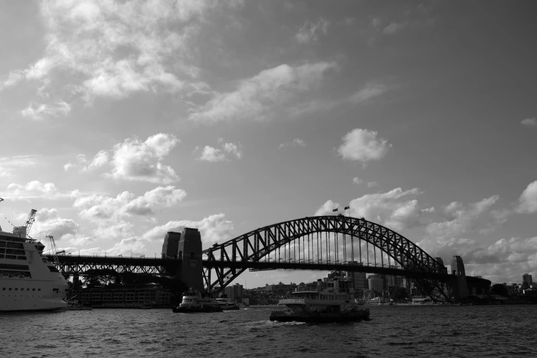 a cruise ship in the water with a bridge in the background, a black and white photo, inspired by Sydney Carline, hurufiyya, july 2 0 1 1, matt rhodes, beautiful day, hay