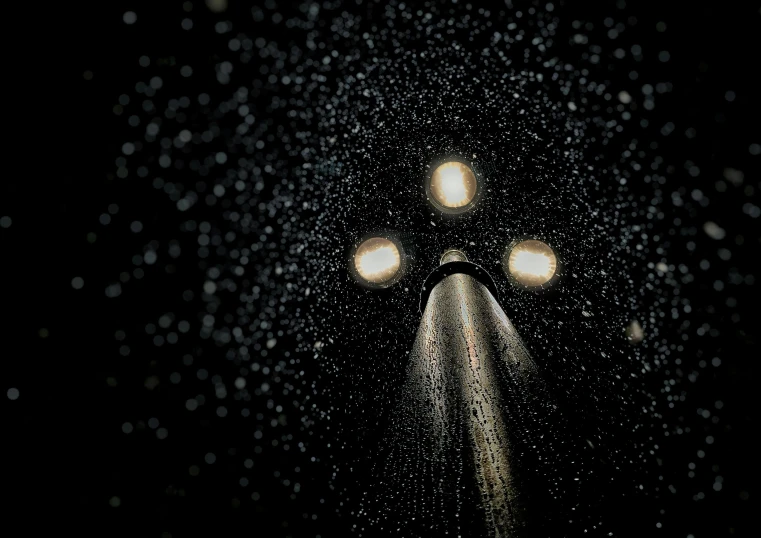 a street light in the rain at night, by Adam Szentpétery, pexels contest winner, conceptual art, looking up at the stars, extreme closeup shot, laser beam ; outdoor, face illuminated