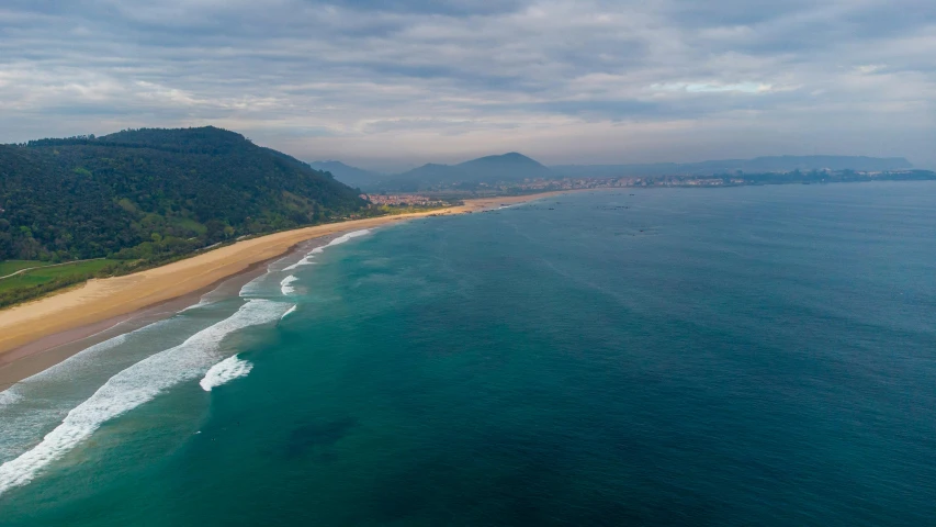 a large body of water next to a beach, by Luis Miranda, unsplash contest winner, renaissance, oscar niemeyer, beach is between the two valleys, 2 5 6 x 2 5 6 pixels, high res 8k