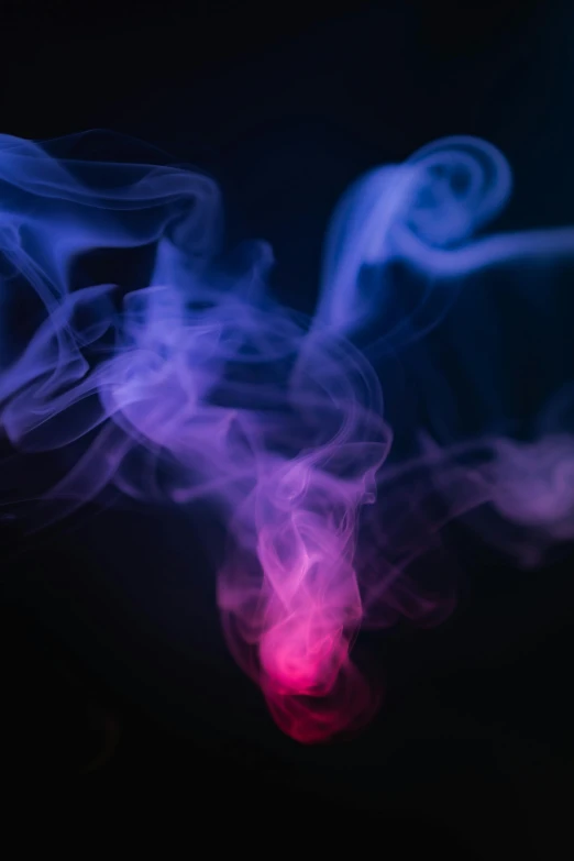 a close up of smoke on a black background, by Matt Cavotta, pexels contest winner, purple and pink and blue neons, blue and white and red mist, diffused, photo taken in 2018