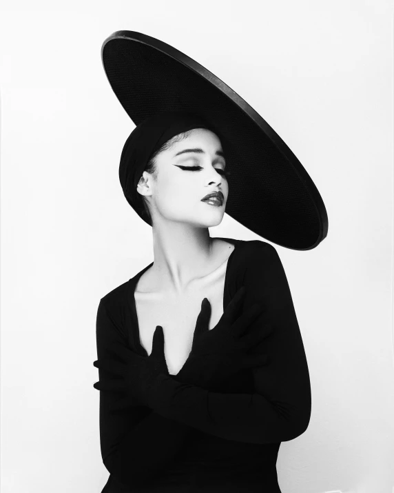 a black and white photo of a woman wearing a hat, inspired by Herb Ritts, natalie shau, nathalie emmanuel, instagram photo, looks like audrey hepburn