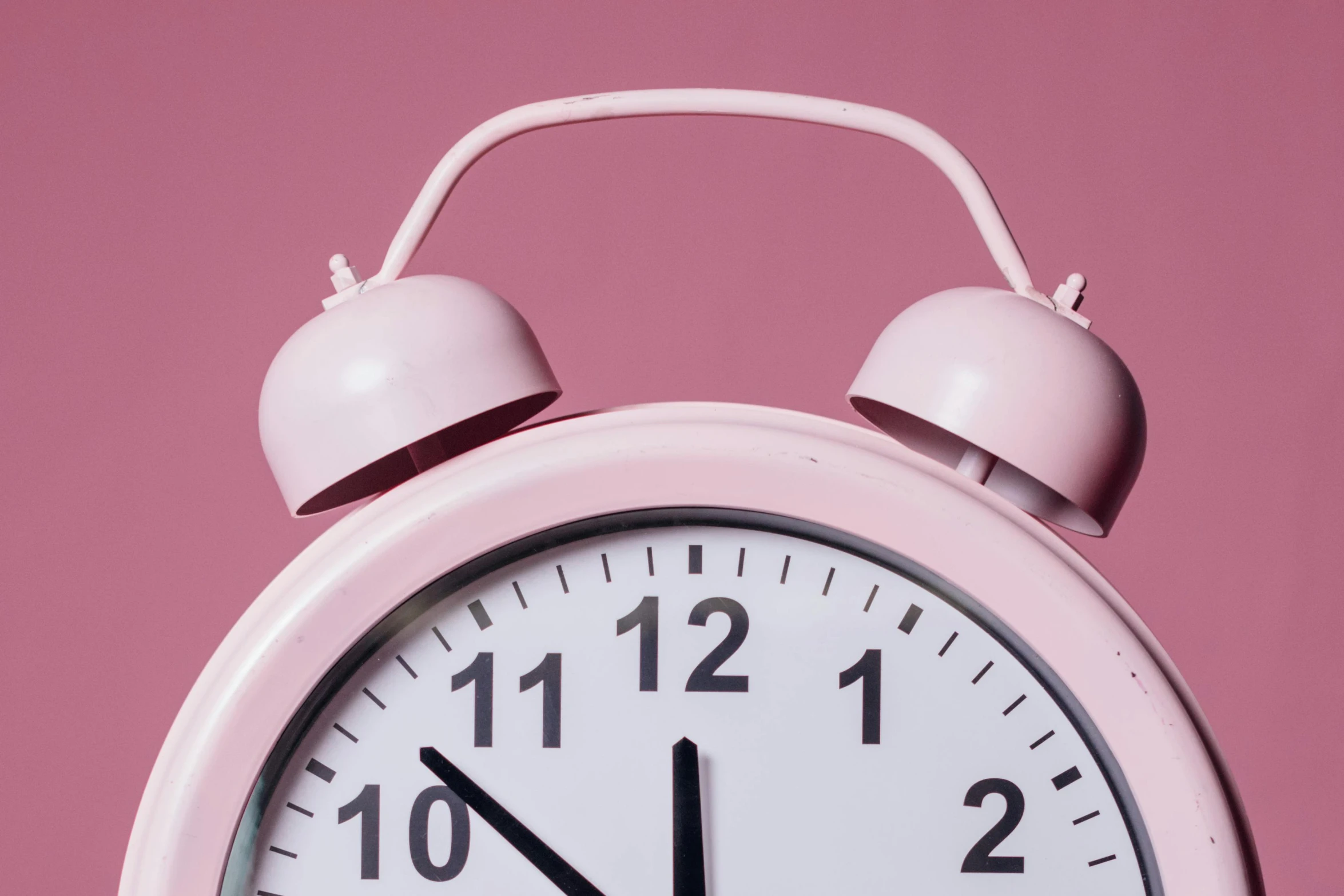 a pink alarm clock on a pink background, trending on pexels, profile picture, bedhead, early night, alex heywood