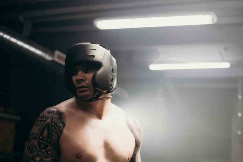 a shirtless man wearing a boxing helmet, inspired by Seb McKinnon, alessio albi, profile image