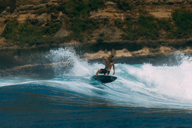 a man riding a wave on top of a surfboard, unsplash contest winner, sumatraism, nina agdal, full body wide shot, ashteroth, lane brown