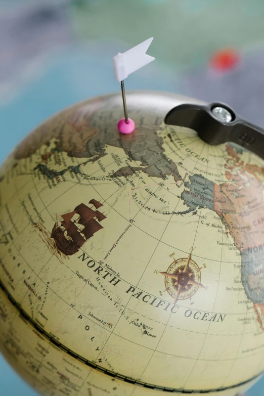 a close up of a globe on a table