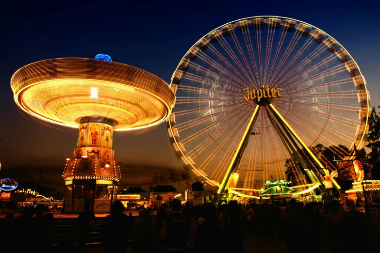 a ferris wheel and a ferris wheel at night, pexels contest winner, 15081959 21121991 01012000 4k, northern france, amusement park buildings, ultrawide image