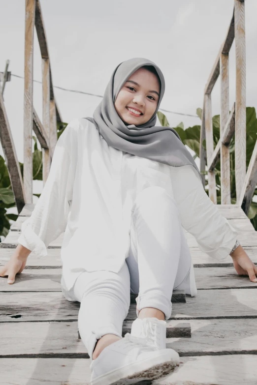 a woman sitting on top of a wooden bridge, inspired by Naza, hurufiyya, wearing a light shirt, white monochrome color!!!!!, vp of marketing, pastel'