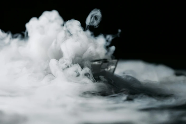 a close up of a bowl of food with smoke coming out of it, a black and white photo, unsplash, process art, sea foam, miniature product photo, cumulus, vapor
