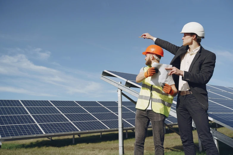 a man and a woman standing in front of solar panels, civil engineer, avatar image, getty images, worksafe. instagram photo