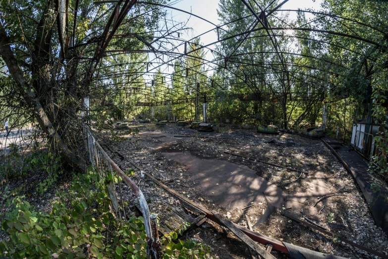 an abandoned building sitting in the middle of a forest, unsplash, graffiti, ground level view of soviet town, slide show, 000 — википедия, panorama