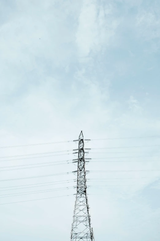 a very tall tower sitting in the middle of a field, unsplash, minimalism, bright thin wires, electric, low quality photo, hyperdetailed