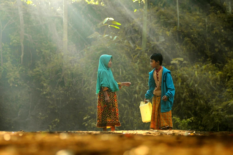 a couple of people that are standing in the dirt, flickr, sumatraism, vibrant light, movie still 8 k, ! movie scene, children