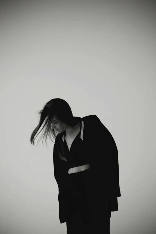 a black and white photo of a woman in a kimono, a black and white photo, by Leo Leuppi, tumblr, conceptual art, travis scott, sad man, in a black hoodie, orelsan