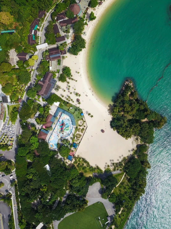 an aerial view of a resort in the middle of the ocean, by Dan Content, pexels contest winner, brown and cyan blue color scheme, thumbnail, splash image, 3/4 front view