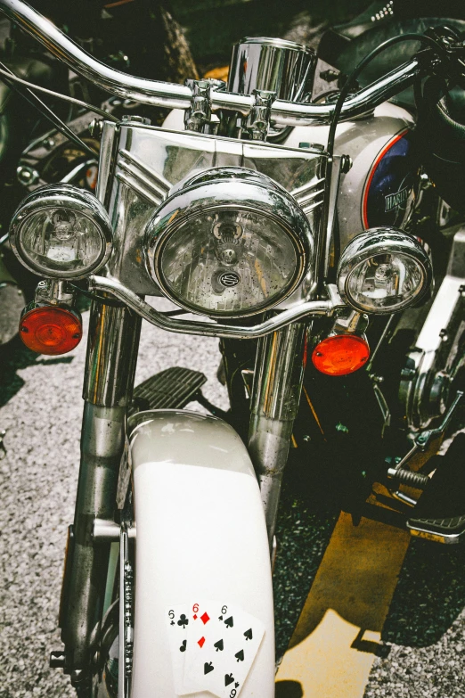 a close up of a motorcycle on a street