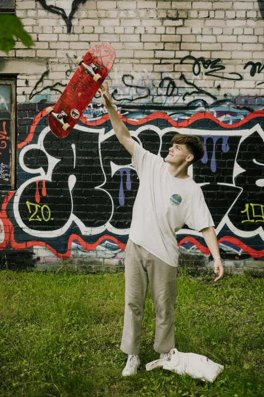 a man holding a skateboard up in the air, bladee from drain gang, highly upvoted, profile picture 1024px, small