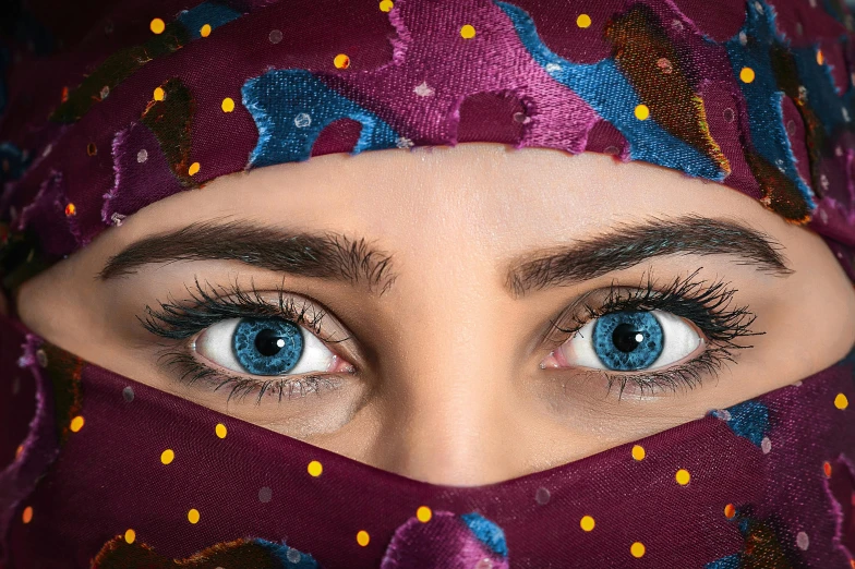 a close up of a person wearing a hijab, trending on pexels, hyperrealism, symmetric azure eyes, arabian nights, multicoloured, middle eastern