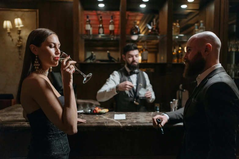 a man and a woman standing in front of a bar, pexels contest winner, renaissance, drinking a martini, profile image, hunting, three cats drinking in a bar