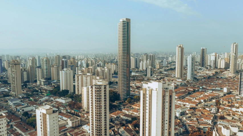 an aerial view of a city with tall buildings, pexels contest winner, hyperrealism, brazilian, colombian, 1970s photo, 15081959 21121991 01012000 4k