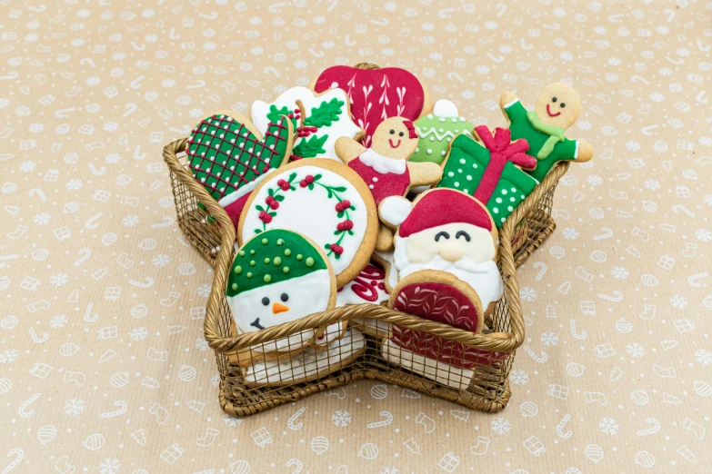 a basket filled with christmas cookies on top of a table, by Sylvia Wishart, square, craft, multicoloured, thumbnail