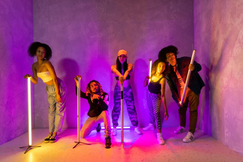 a group of women standing next to each other in a room, an album cover, pexels contest winner, graffiti, with light-saber, dancing on a pole, white neon lighting, thumbnail