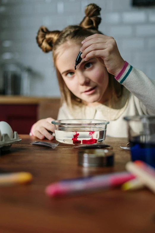 a little girl that is sitting at a table, experimenting in her science lab, kek, teenage girl, thumbnail