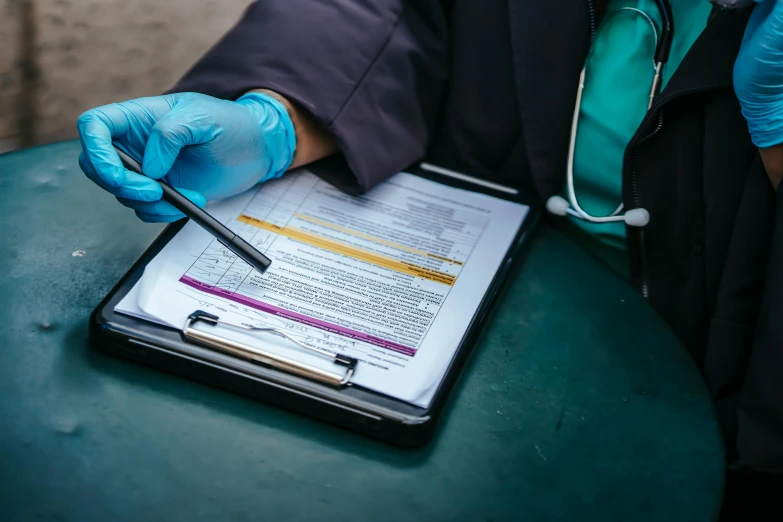 a doctor writing on a clipboard with a stethoscope, by Adam Marczyński, pexels contest winner, process art, urine collection bag, background image, ground level shot, thumbnail