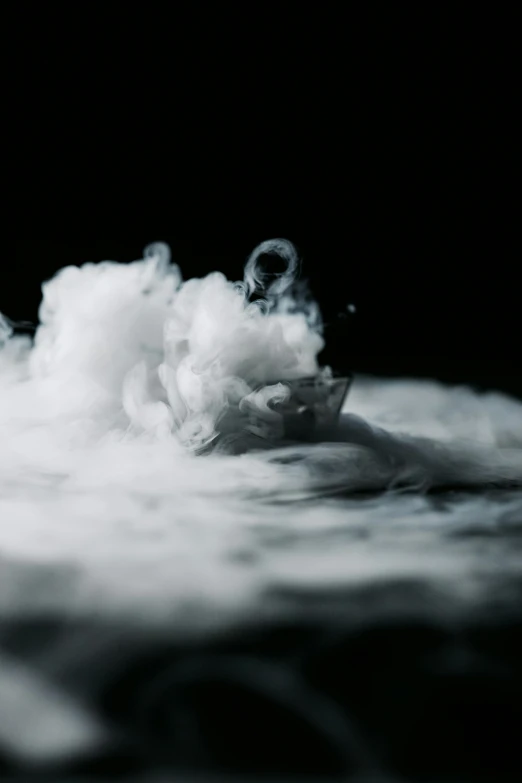 a black and white photo of a cloud of smoke, unsplash, surrealism, water particle in front, dry ice, slide show, closeup portrait shot