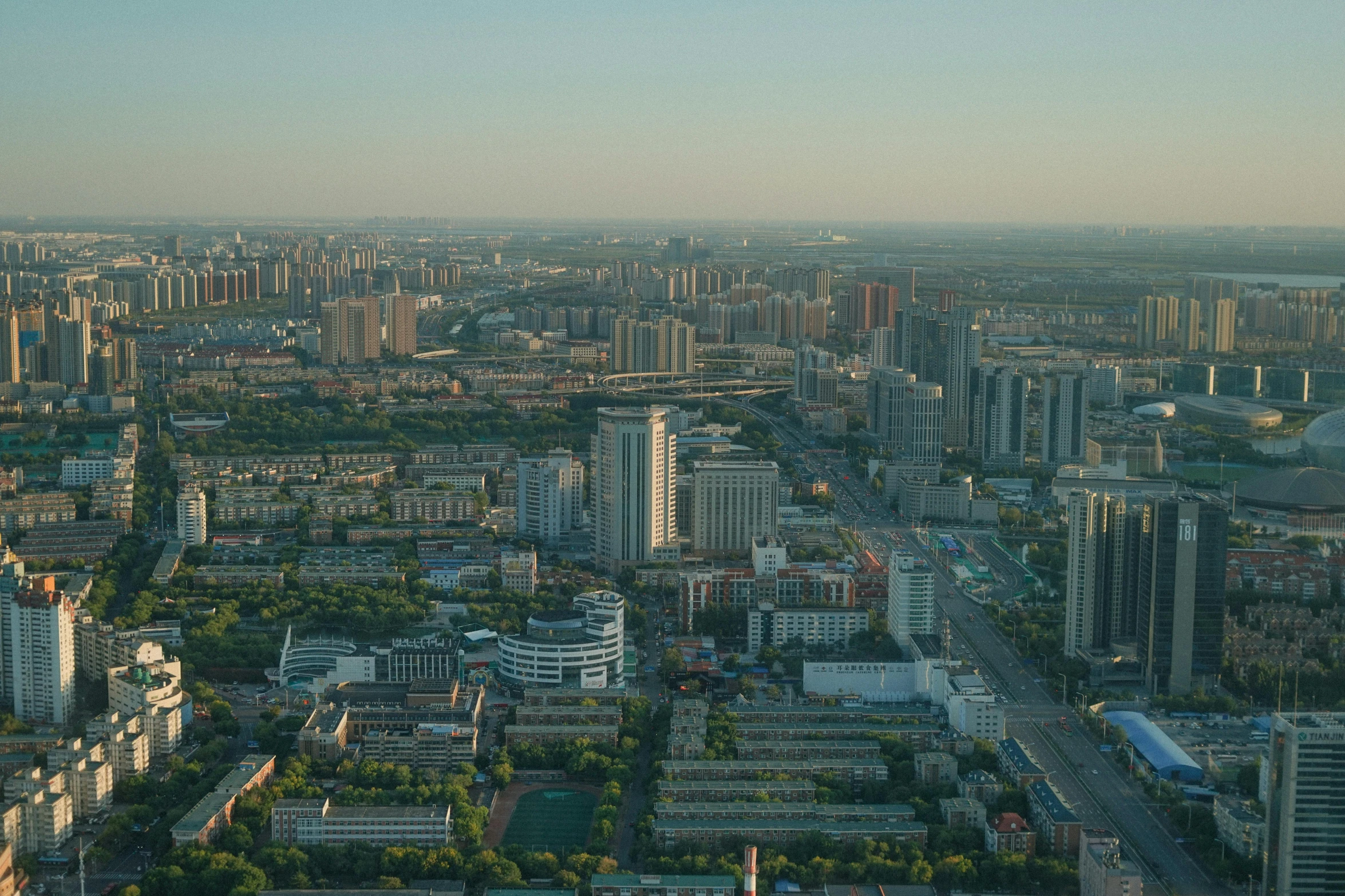an aerial view of a city with lots of tall buildings, a picture, happening, baotou china, high res 8k, rectangle, image