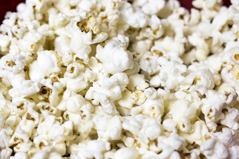 a bowl of popcorn sitting on top of a table, up-close, extra crisp image, thumbnail, fan favorite