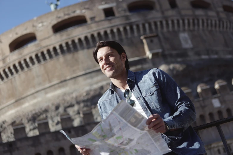 a man holding a map in front of a building, a portrait, pexels contest winner, renaissance, colosseum, 15081959 21121991 01012000 4k, promotional image, thumbnail