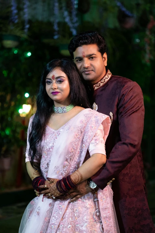 a man and a woman standing next to each other, by Rajesh Soni, wearing festive clothing, bangladesh, profile image, television show