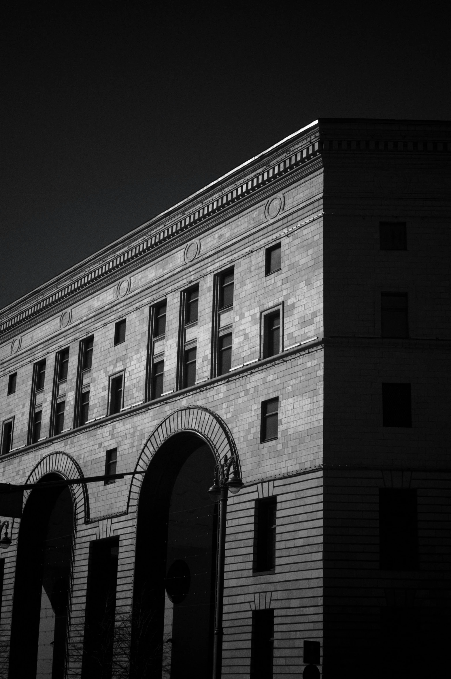 a black and white photo of a building, by Andrew Domachowski, government archive, square lines, monochrome color, front lit
