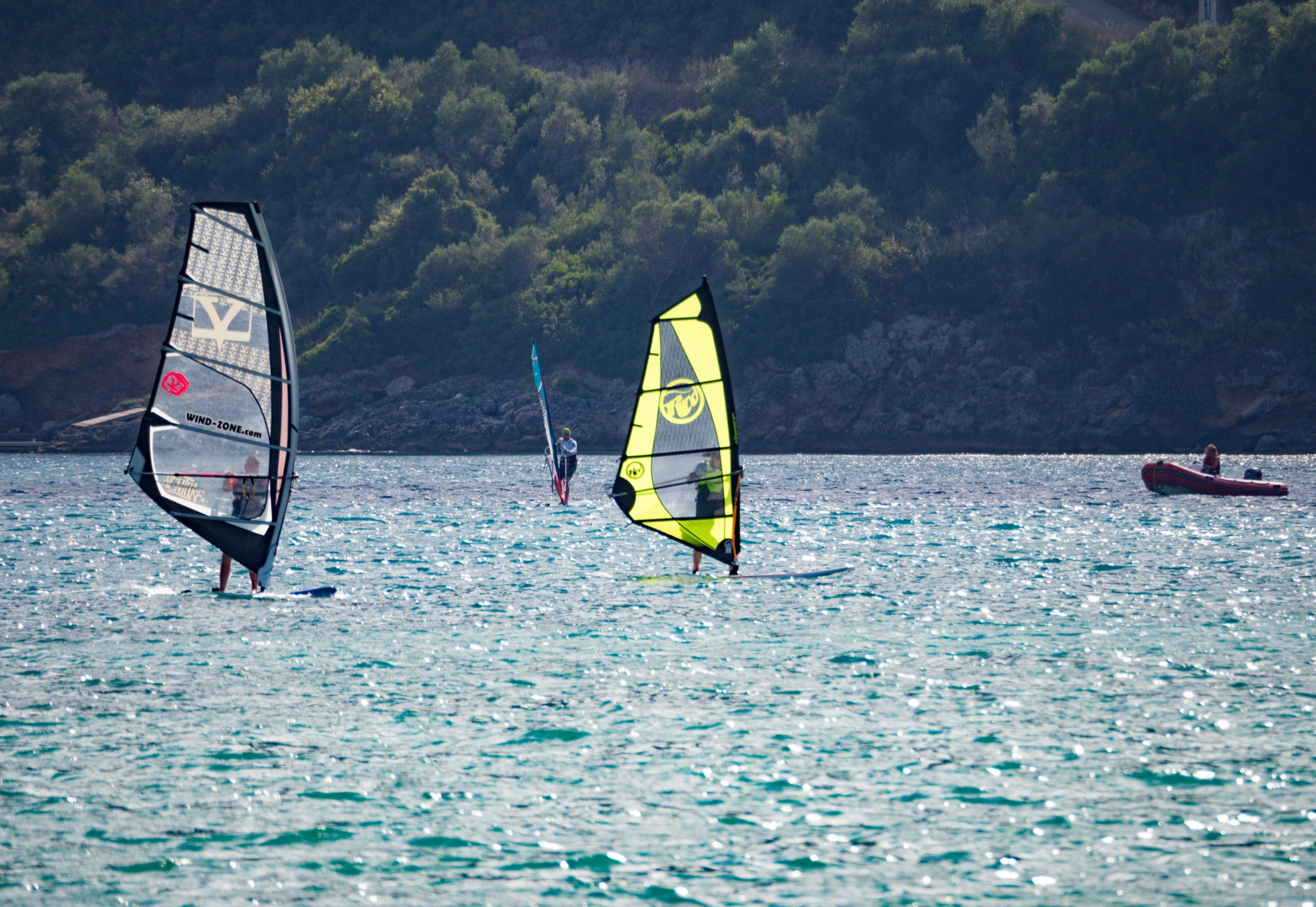 a group of people windsurfing in the ocean, jeszika le vye, profile image