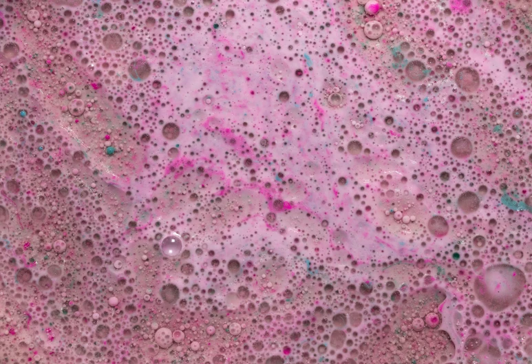a close up of soap bubbles on a pink surface, an ultrafine detailed painting, inspired by Howardena Pindell, flickr, moon craters, berry juice drips, pbr textures, cake