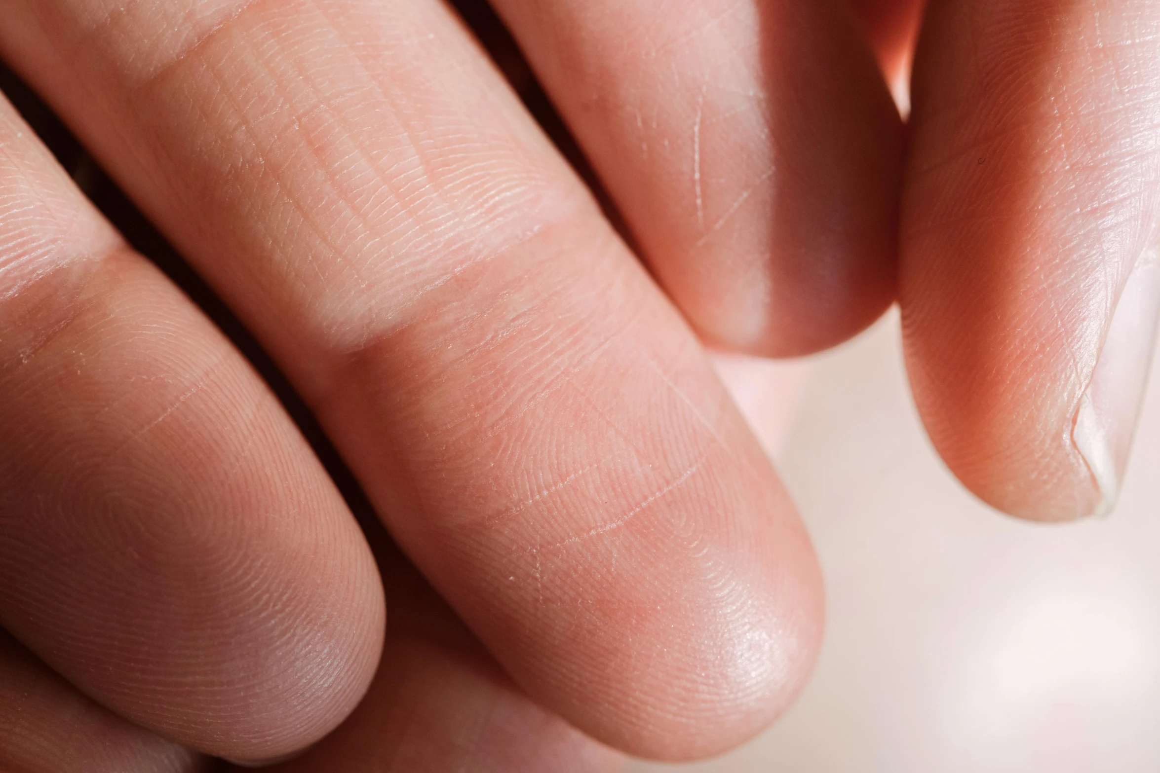 a close up of a person's hand holding a toothbrush, a stipple, trending on pexels, hyperrealism, cracked body full of scars, palm pattern visible, close-up of thin soft hand, bald lines