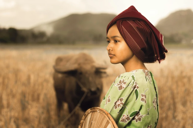 a little girl standing in a field with a basket, inspired by Fernando Amorsolo, pexels contest winner, sumatraism, human dressed as a bull, somali woman, handsome girl, profile picture 1024px